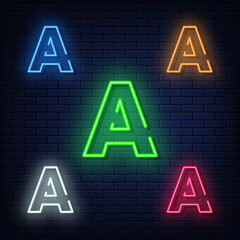 Neon letters, five colors: red, blue, green, yellow, white. Isolated font on a blue brick wall background. Vector illustration eps 10.