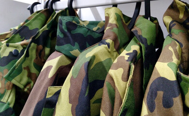 Samples camouflage military clothes in the store, Camouflage military jackets