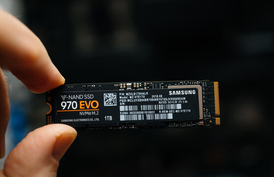 Paris, France - Jan 18, 2019: Male hand holding new NVME disk from Samsung SSD 970 Evo V-Nand series with 1 tb terabyte of memory