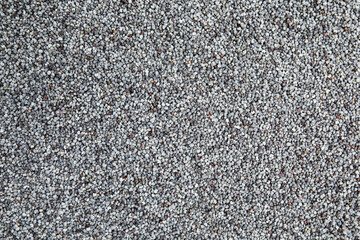 Heap of poppy seeds as background, top view. Veggie food