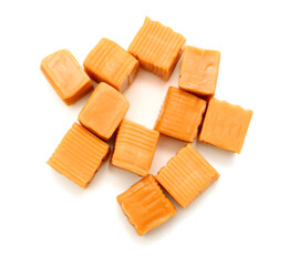 Caramel candies isolated on white background