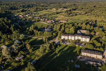 Aerial view of Mezvalde village in sunny summer evening, Latvia.