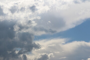 Fototapeta na wymiar Clouds on bright blue sky background
