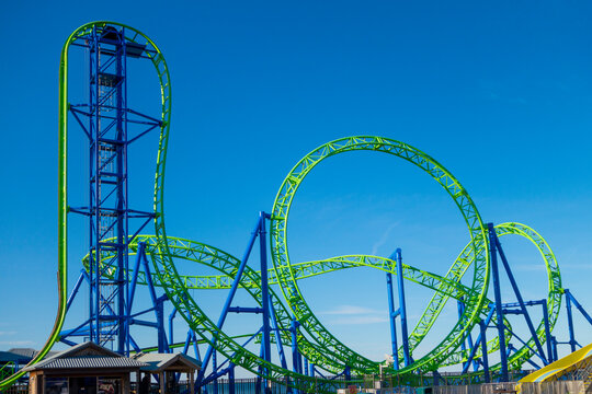 blue green rollercoaster tracks fair ride