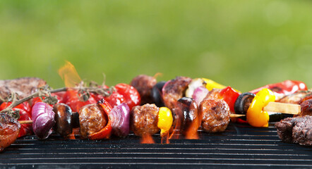 Delicious grilled skewer meat with vegetables.