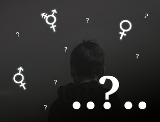 Teen problem Family issues Gender confusion in teenager. A teen boy pointing at gender symbols of male bigender and transgender. Concept of choice gender confusion or dysphoria. - obrazy, fototapety, plakaty