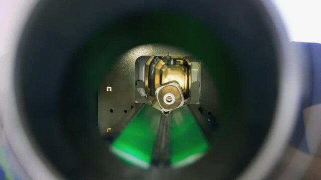 Mechanism inside of reverse vending bottle recycling machine.