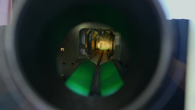Mechanism inside of reverse vending bottle recycling machine.