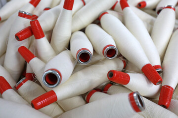 Cotton yarn is piled up in a spinning mill