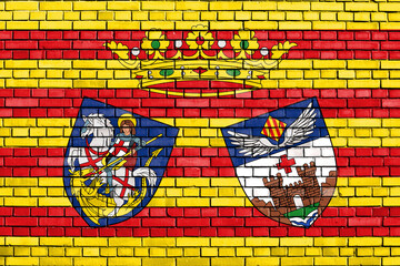 flag of Alcoy painted on brick wall