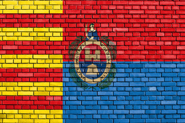flag of Elche painted on brick wall