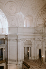 San francisco city hall interior featuring dome and sculpture