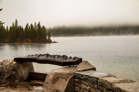 foggy and cloudy autumn morning in Jenny Lake in Grand Teton National Park in Wyoming.