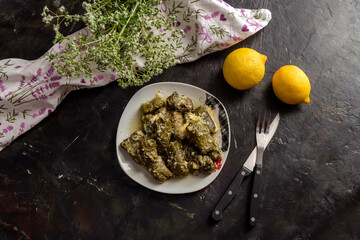 Dolmas in egg-lemon sauce (Greek cuisine)