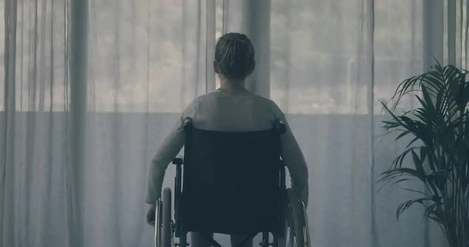 Disabled woman at home alone