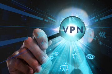 Business, Technology, Internet and network concept. Young businessman working on a virtual screen of the future and sees the inscription: VPN