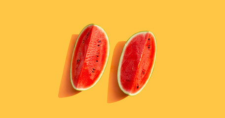 Watermelon on orange background. Summer background concept.