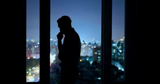 worried asian businessman in office