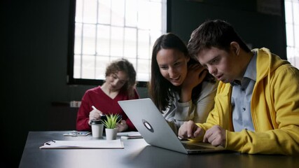 Down-syndrome man attending education class in community center, inclusivity of disabled person. - Powered by Adobe
