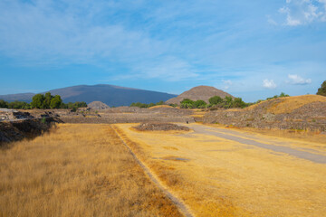 Pyramid of the Sun and Moon from Avenue of the Dead in Teotihuacan in city of San Juan Teotihuacan, State of Mexico, Mexico. Teotihuacan is a UNESCO World Heritage Site since 1987. 