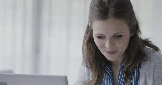 Woman doing online shopping at home