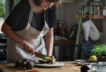 Woman preparing dinner in the kitchen