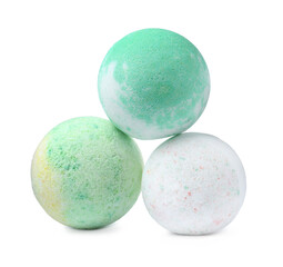 Three colorful bath bombs on white background