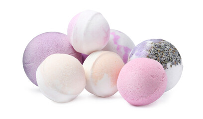 Many colorful bath bombs on white background