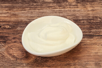 Sour cream in the bowl