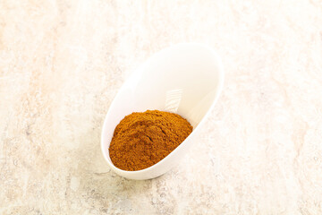 Dry Paprika powder in the bowl