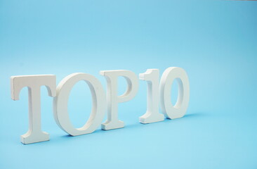 Top 10 word alphabet letters on blue  background