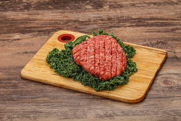 Raw beef burger cutlet for cooking