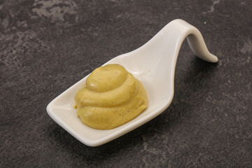 Dijon mustard sauce in the bowl