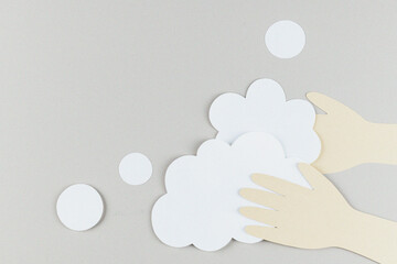 Washing hands with soap paper craft background