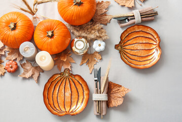 Beautiful table setting for Thanksgiving Day celebration on light background