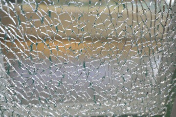 Broken tempered glass as background photo