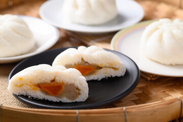Steamed bun stuffed with minced pork and salted egg yolk, Asian food