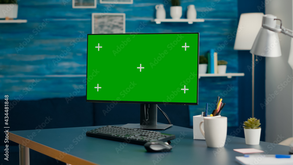 Aufkleber modern computer with mock up green screen chroma key set up for personal business work. professional