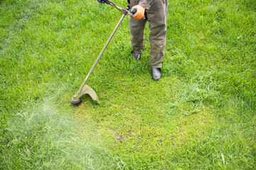 Lawn mover on green grass. Machine for cutting lawns.