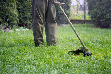 Lawn mover on green grass. Machine for cutting lawns.