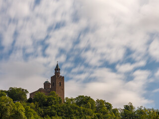 Tsarevets fortress in Veliko Tarnovo (Turnovo) in Bulgaria on a summer day with a cloudy sky.