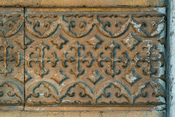 Reliefs abstraction of real texture, volumetric patterns in the form of stucco molding on buildings, houses, cultural objects, cast from concrete and painted with paint