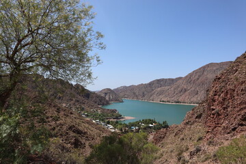 Panorama view to the Cañon del atuel San Rafael Mendoza in Argentina South Aermica, dry mountains and blue water in the lake