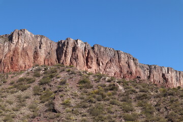Nature scene in El Nihuil San Rafael Mendoza in Argentina South America, desert scene, dry mountains and a blue sky