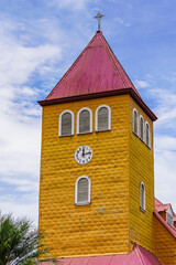 Beautiful aerial view of the Aquiares town and its iconic yellow church in Cartago Costa Rica