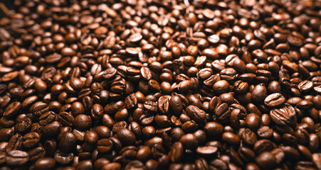 Obraz premium Background of roasted fresh brown coffee beans