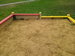 children's sandbox on the playground in the daytime