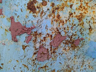 rusty and old metal coating of different colors from metal corrosion