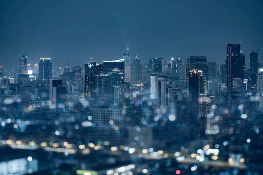 Beautiful city background with downtown and bokeh.