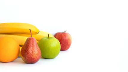 Banner. Fruits: banana, orange, apple and pear, isolated on a white background. Copy space.